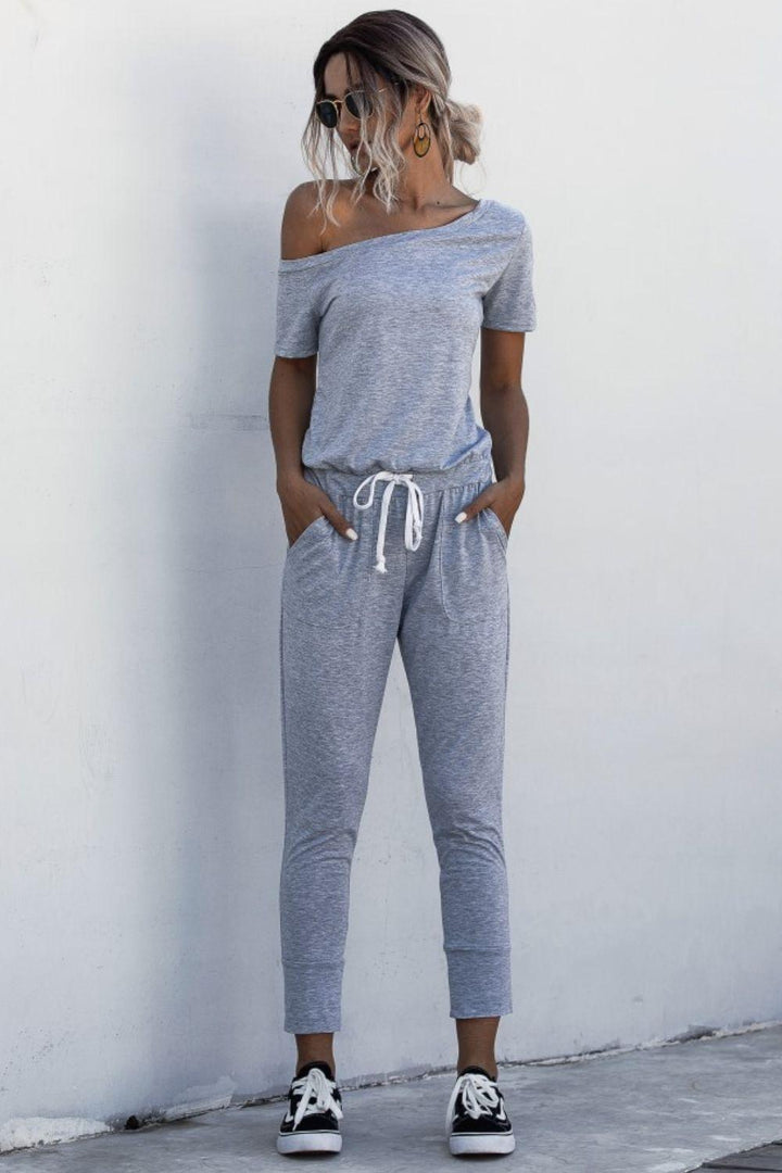 Asymmetrical Neck Tied Jumpsuit with Pockets - BELLATRENDZ