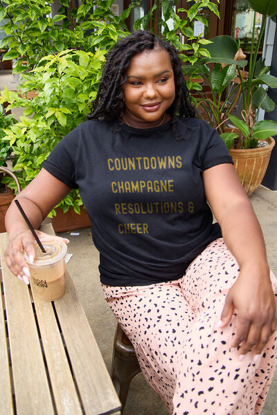 Simply Love Full Size COUNTDOWNS CHAMPAGNE RESOLUTIONS & CHEER Round Neck T-shirt