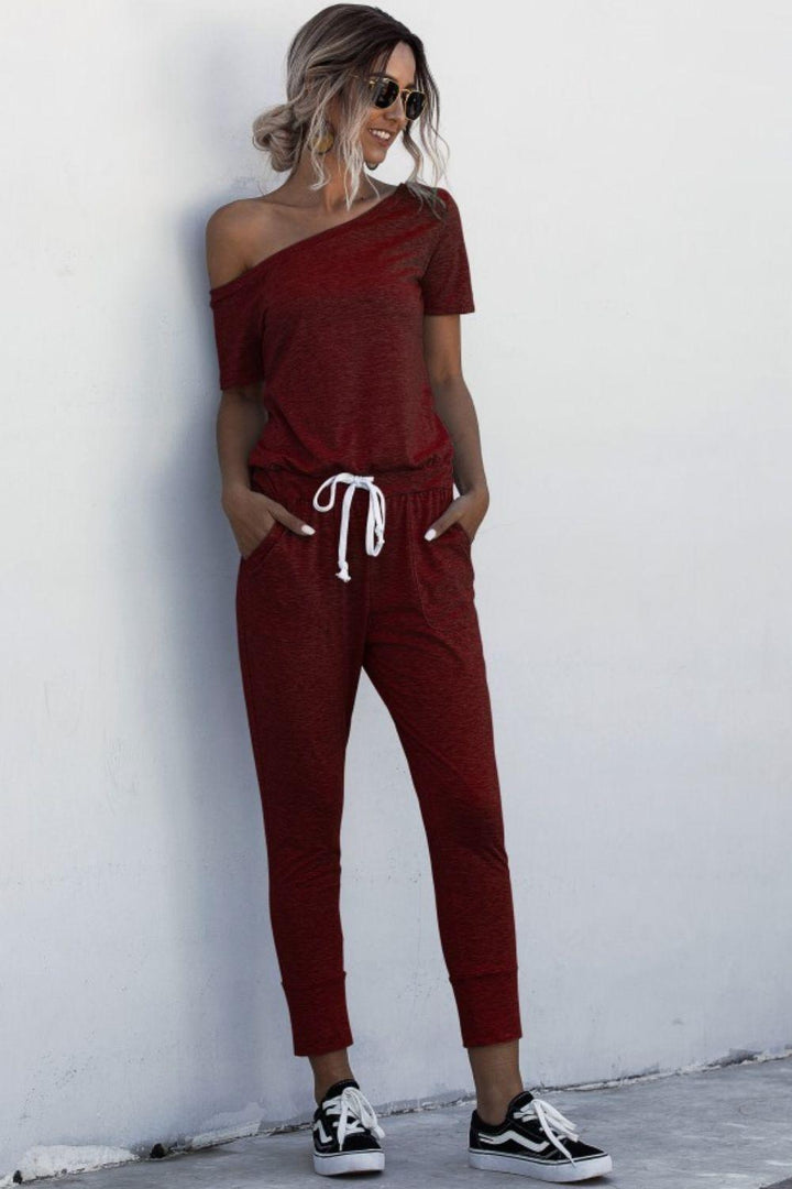 Asymmetrical Neck Tied Jumpsuit with Pockets - BELLATRENDZ