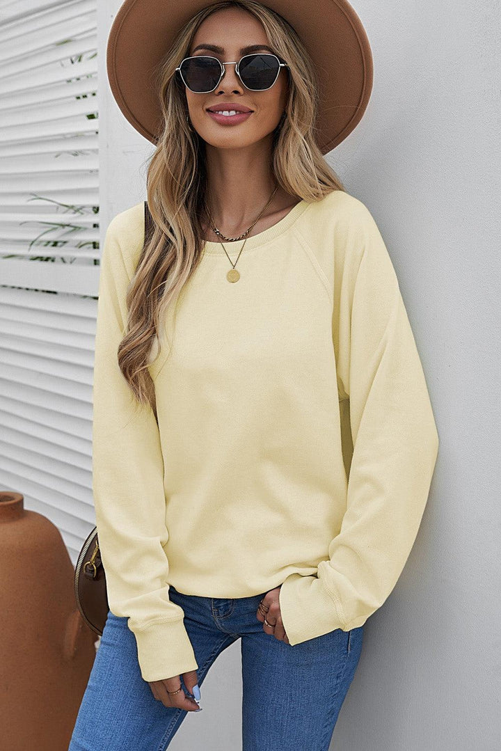 Round Neck Raglan Sleeve Exposed Seam Sweatshirt - BELLATRENDZ