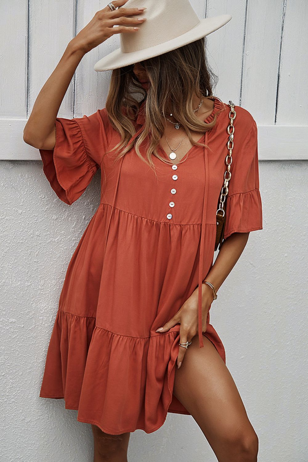 Buttoned Tie Neck Tiered Mini Dress