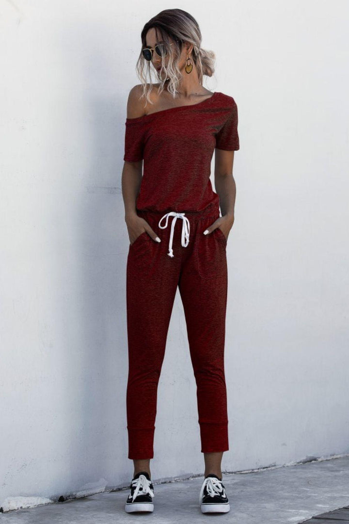 Asymmetrical Neck Tied Jumpsuit with Pockets - BELLATRENDZ