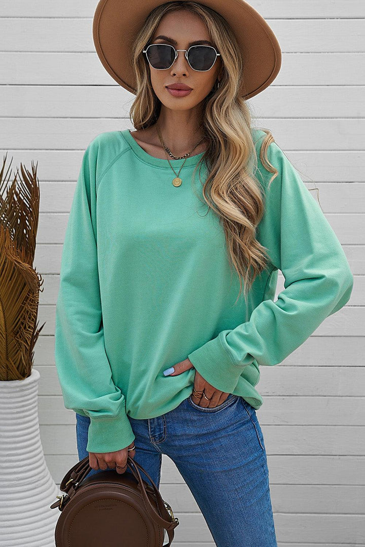 Round Neck Raglan Sleeve Exposed Seam Sweatshirt - BELLATRENDZ